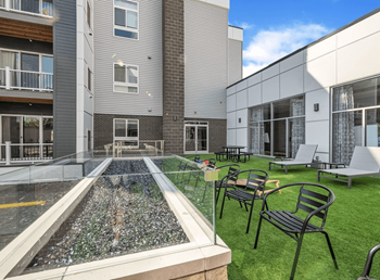 Outdoor patio with barbecues and fire pit